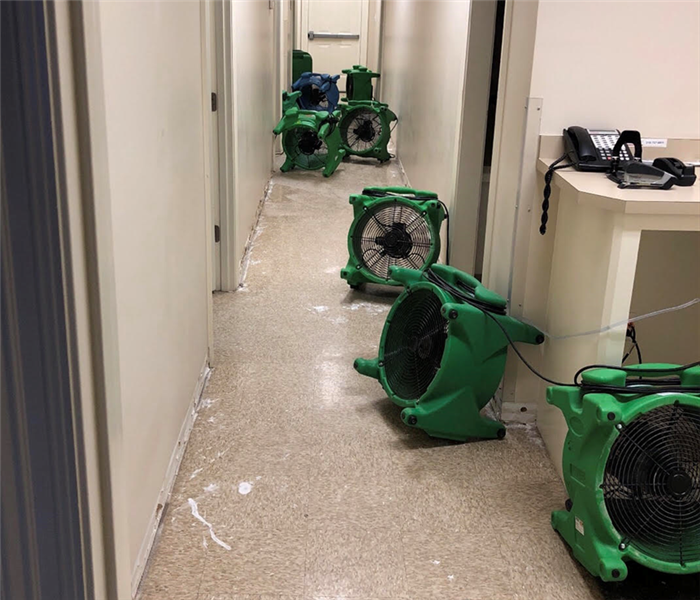 SERVPRO air movers drying hallway of doctor's office 